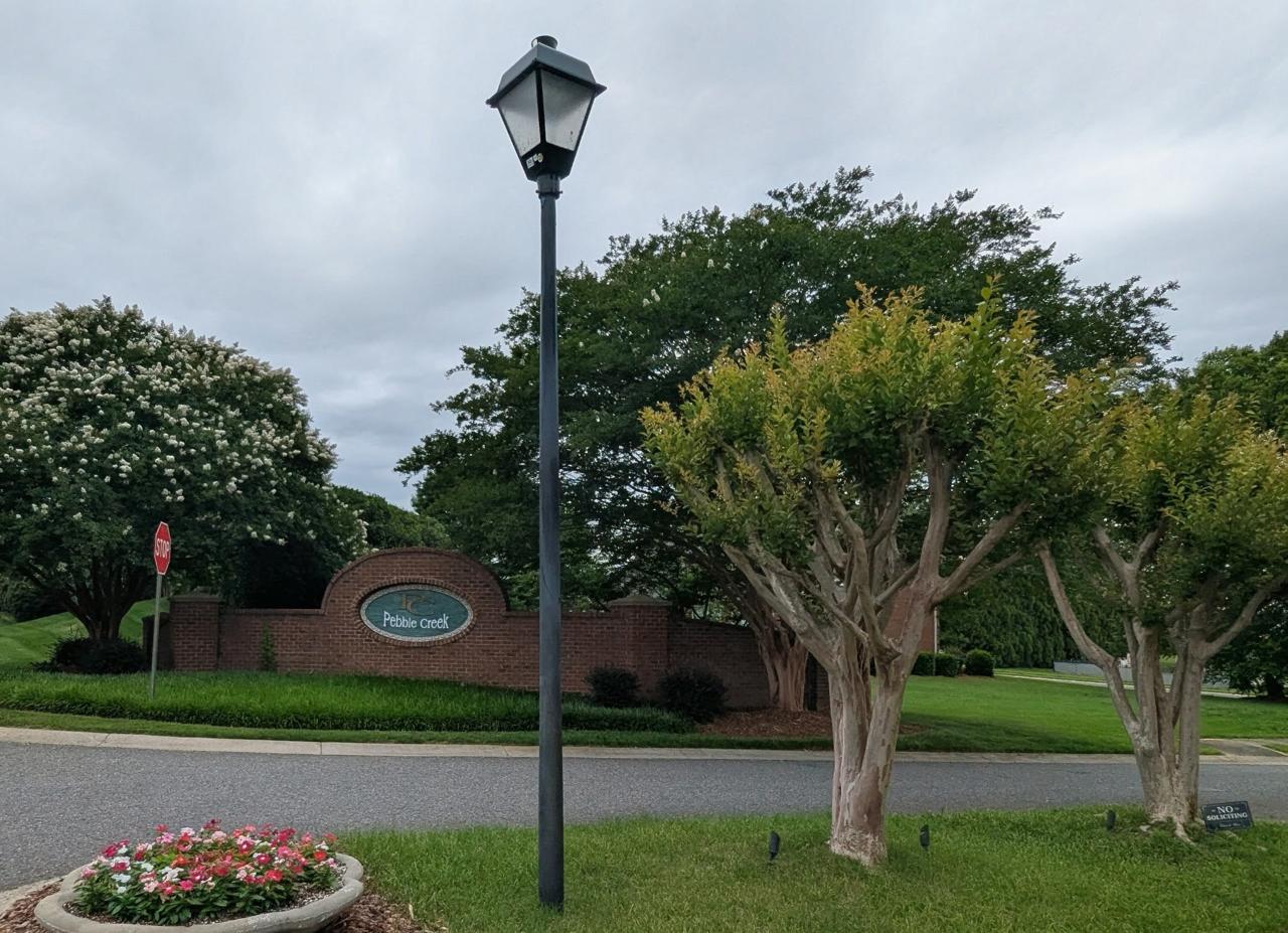 Pebble Creek entrance with no soliciting sign